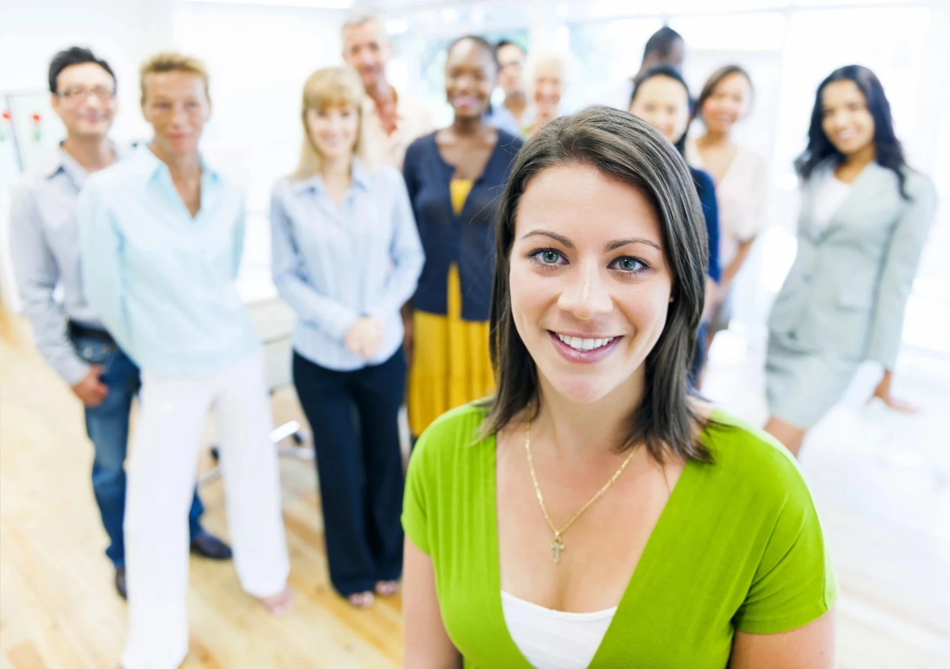 A group of people standing in front of each other.